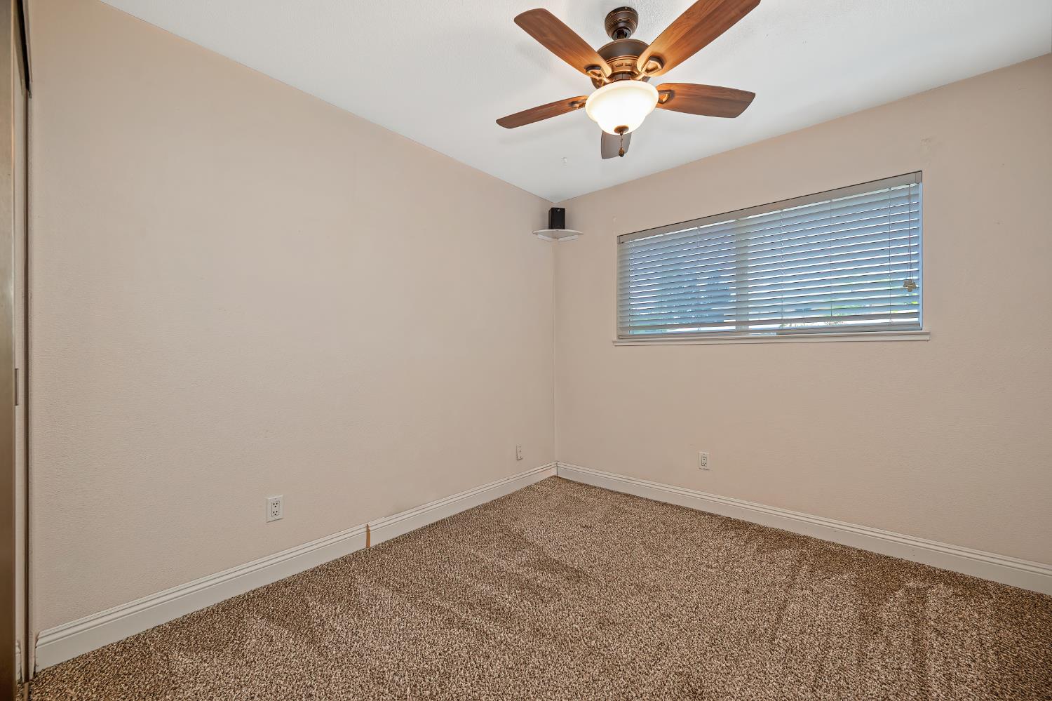 2700 Lassen Way Rocklin, CA 95677 - Photo 12 of 36 an empty room with a window and a fan
