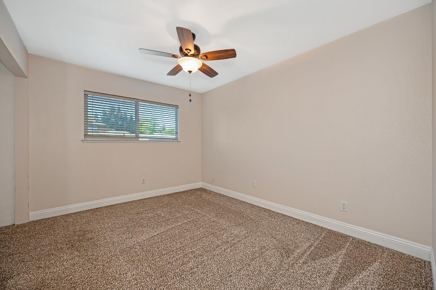2700 Lassen Way Rocklin, CA 95677 - Photo 15 of 36 a view of a ceiling fan and a window