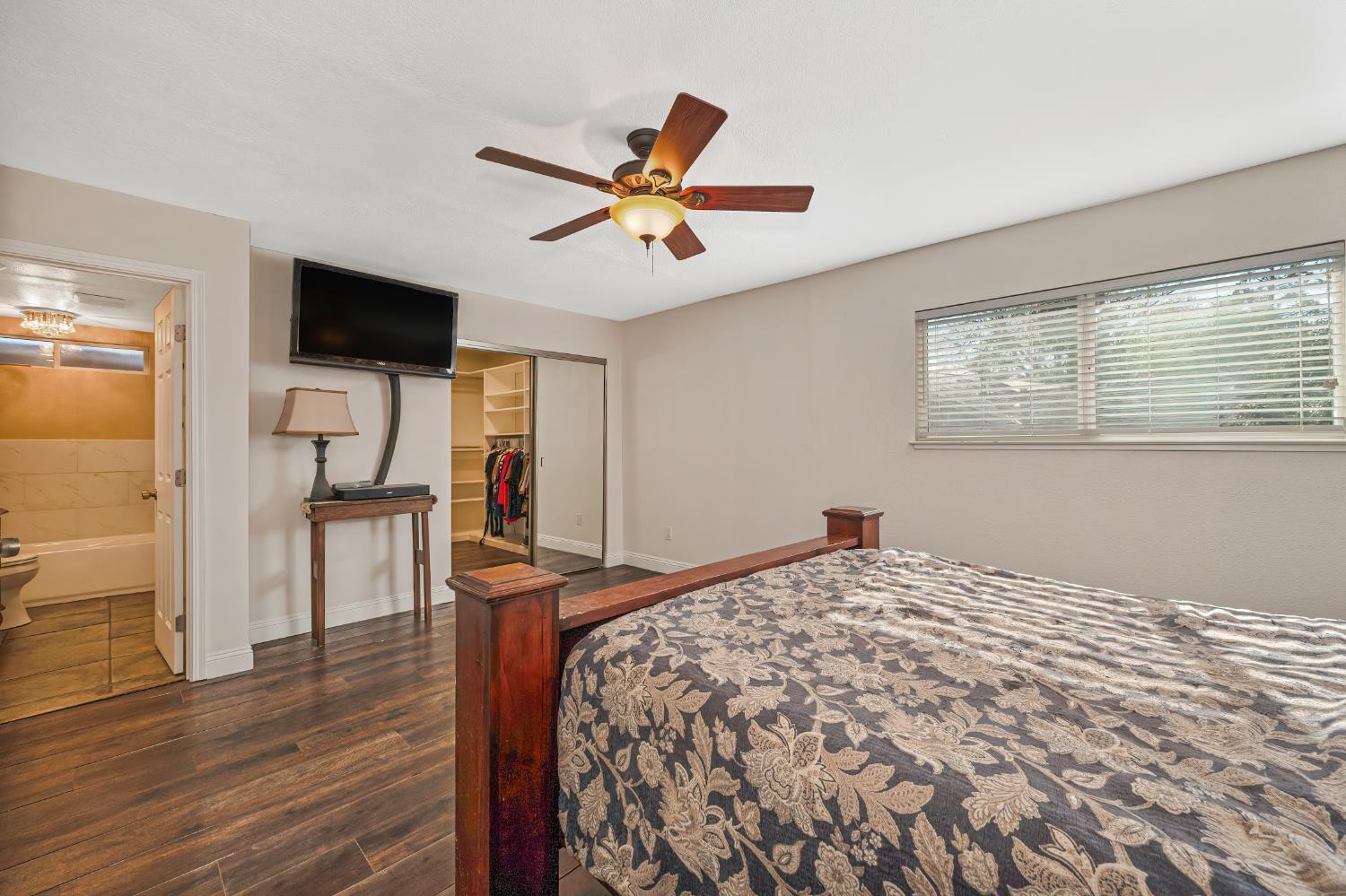 2700 Lassen Way Rocklin, CA 95677 - Photo 17 of 36 a bedroom with a bed and wooden floor