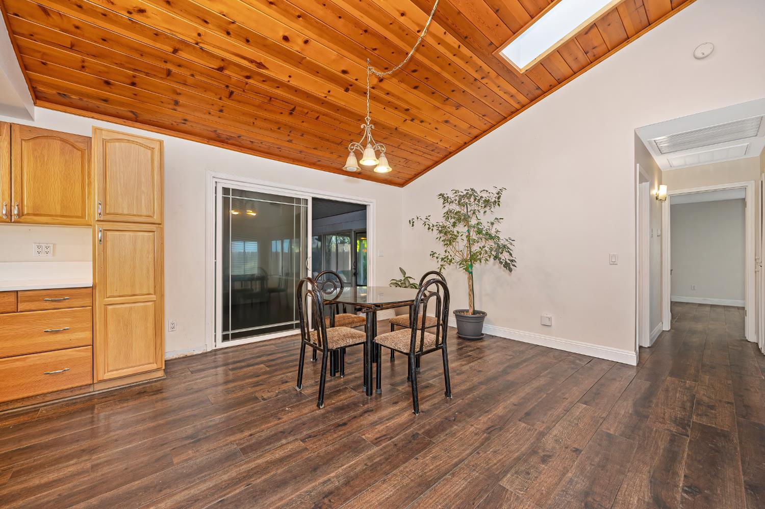 2700 Lassen Way Rocklin, CA 95677 - Photo 8 of 36 a dining room with furniture and wooden floor