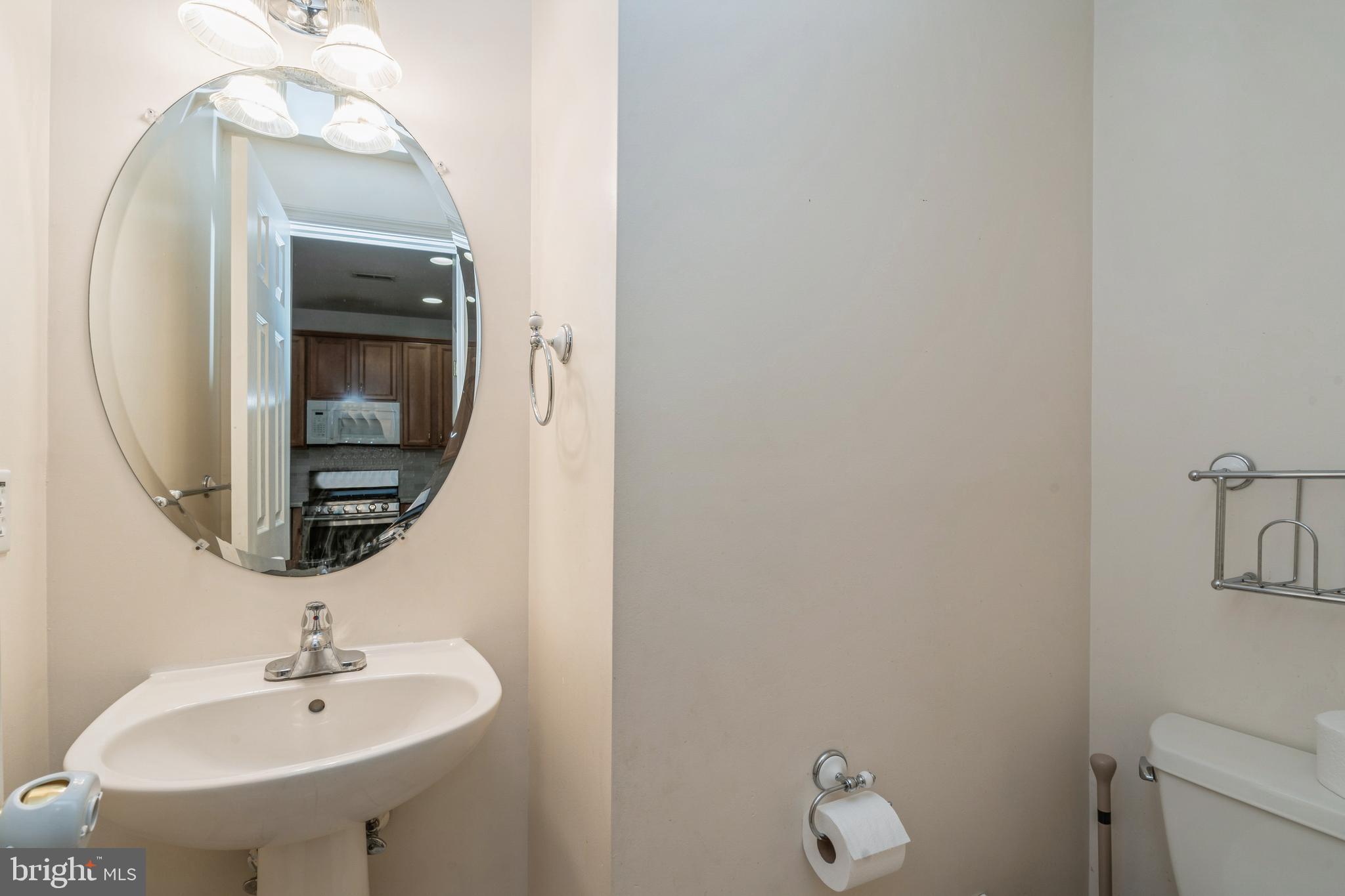 250 Brinley Drive Pennington, NJ 08534 - Photo 14 of 34 a bathroom with a sink and a mirror