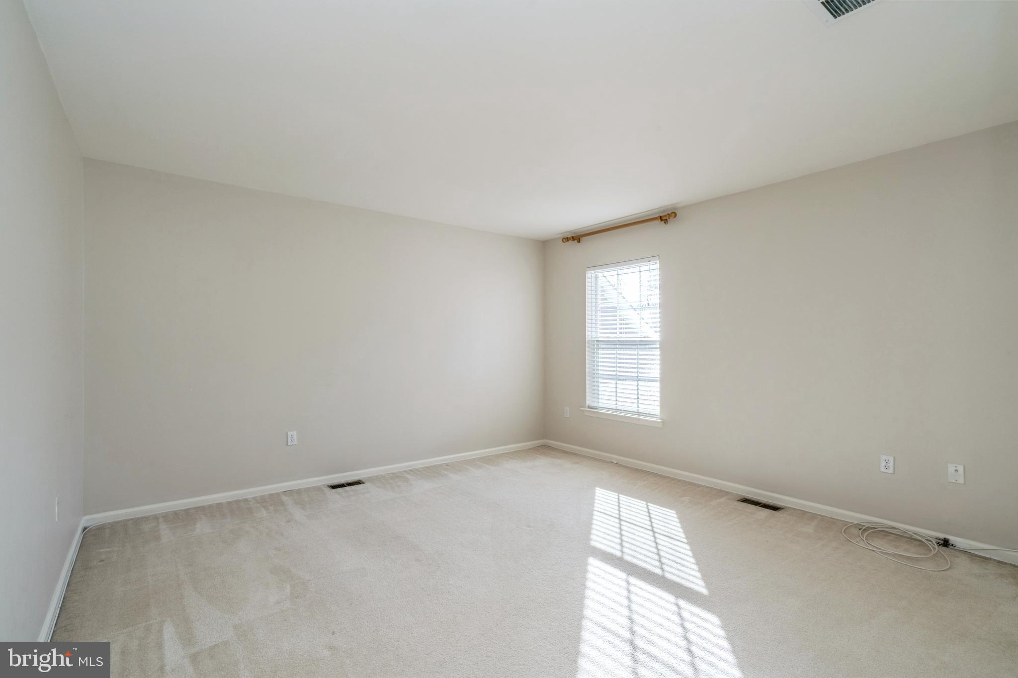 250 Brinley Drive Pennington, NJ 08534 - Photo 25 of 34 a view of an empty room and window