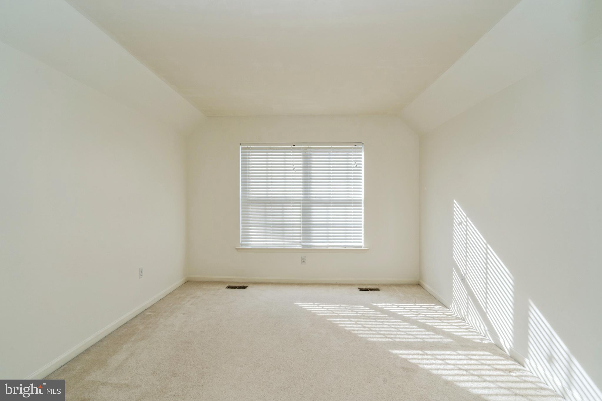 250 Brinley Drive Pennington, NJ 08534 - Photo 31 of 34 an empty room with a white walls and a window