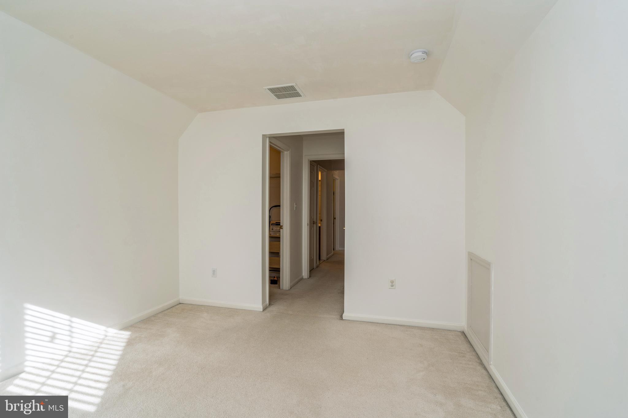 250 Brinley Drive Pennington, NJ 08534 - Photo 32 of 34 a view of an empty room and a window