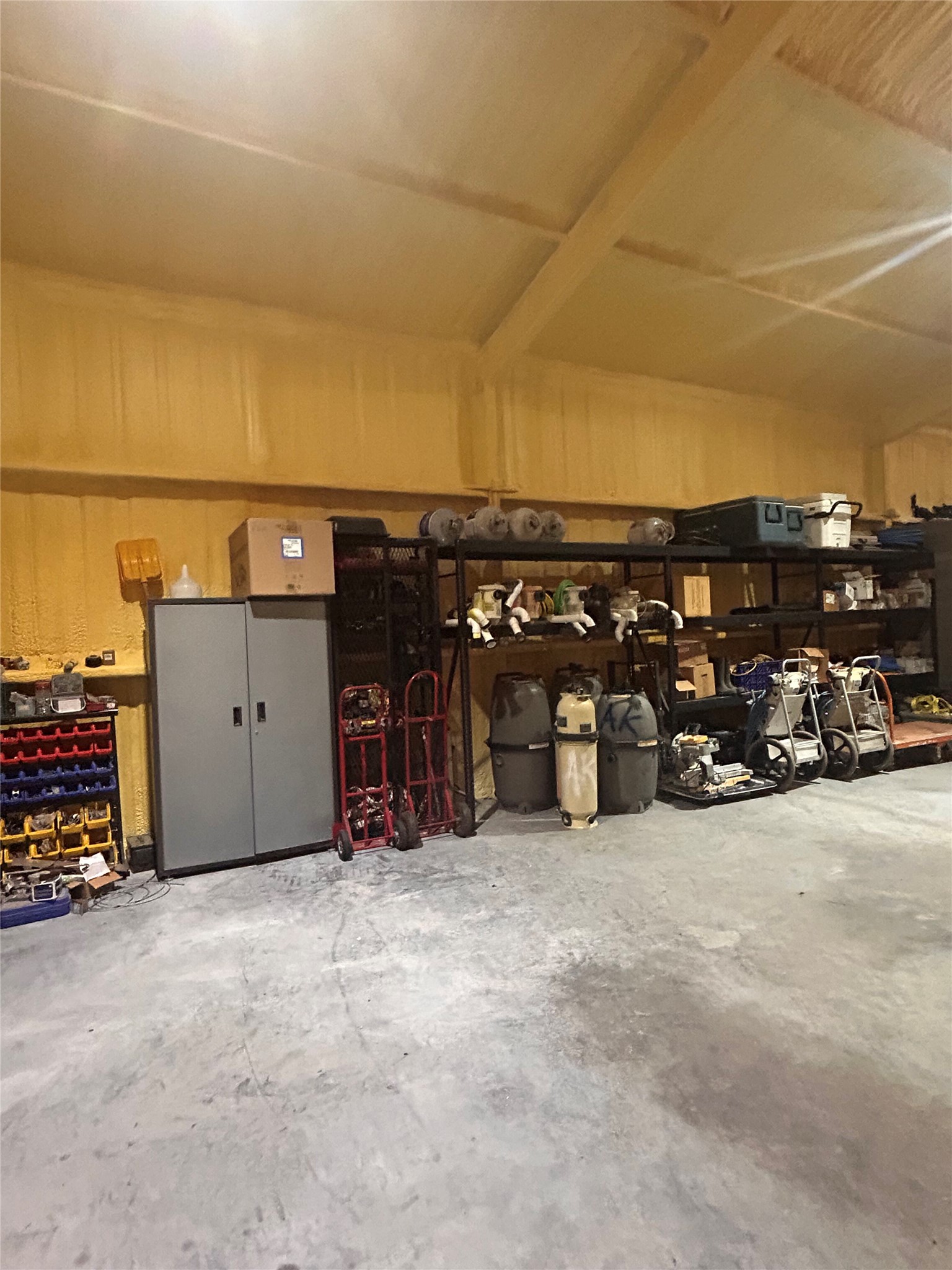 3001 County Road 255 Georgetown, TX 78633 - Photo 31 of 35 Ample storage in the workshop with concrete floor.
