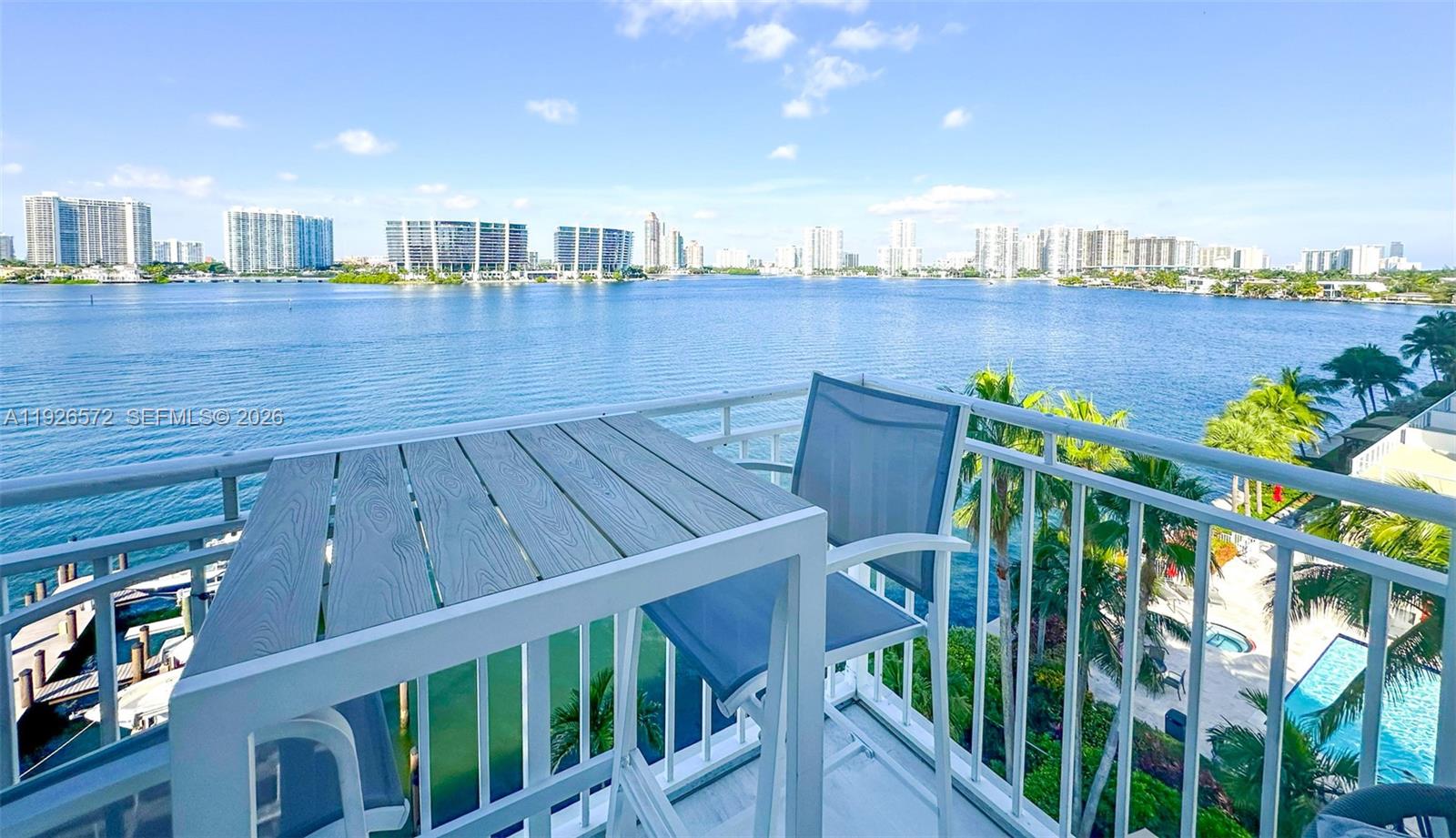 18000 North Bay Road, Unit 603 Sunny Isles Beach, FL 33160 - Photo 9 of 30 a view of a balcony with seating space