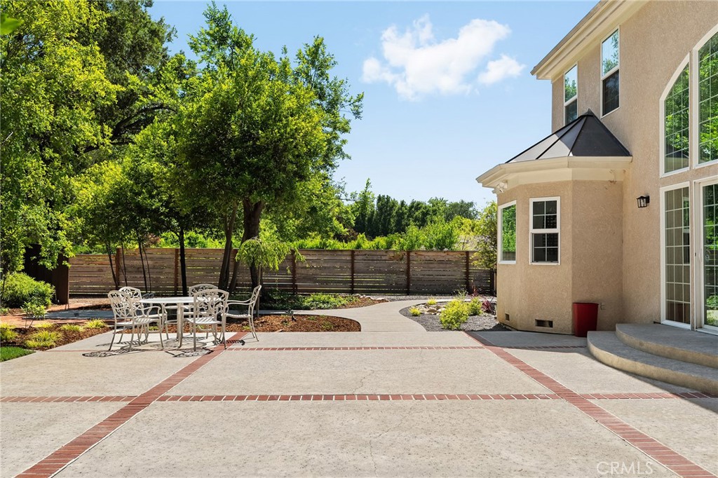 897 Filbert Avenue Chico, CA 95926 - Photo 56 of 66 a view of a patio with a table and chairs