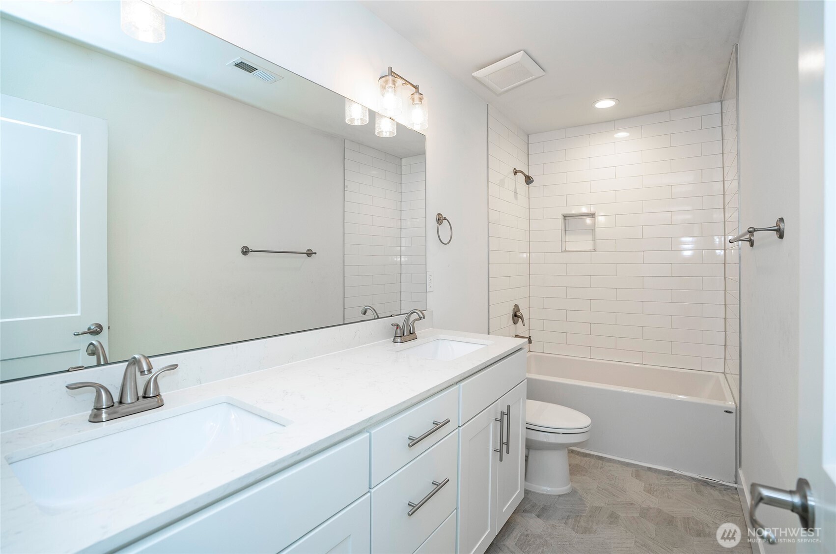 10 East Compass Lane Allyn, WA 98524 - Photo 21 of 35 a bathroom with a sink a toilet and shower