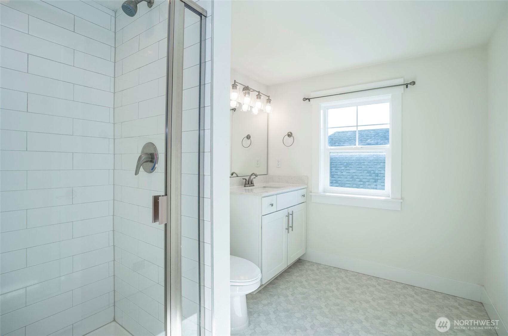 10 East Compass Lane Allyn, WA 98524 - Photo 25 of 35 a bathroom with a granite countertop sink a mirror and a shower