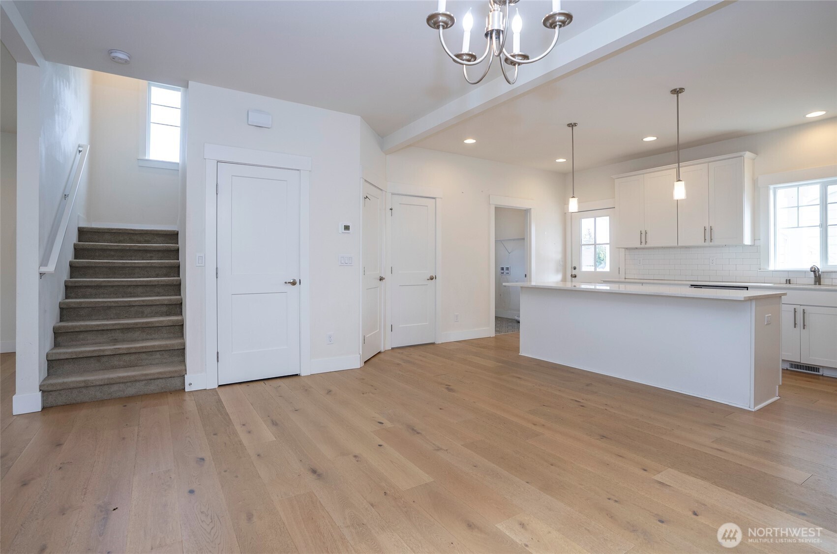 10 East Compass Lane Allyn, WA 98524 - Photo 10 of 35 a view of a kitchen with an empty space and a window