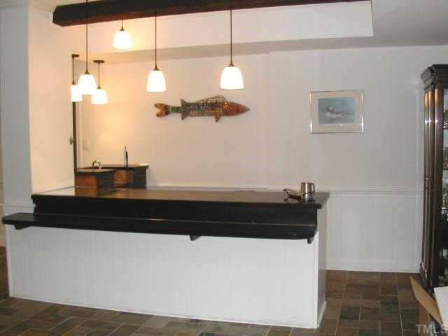 8925 Oneal Road Raleigh, NC 27613 - Photo 9 of 11 View of Wet Bar in Family Room. Perfect for Entertaining from Inside or Outside on Deck and Patio.