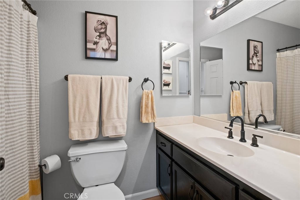 10811 Nambe Road Apple Valley, CA 92308 - Photo 17 of 31 Hall Bathroom