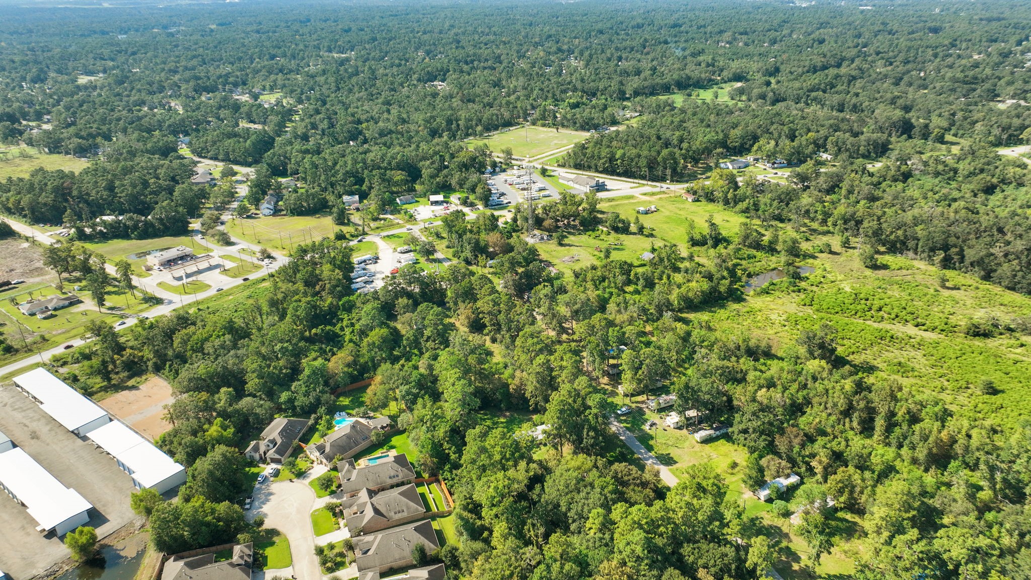 19652 Ceal Road Porter, TX 77365 - Photo 9 of 10 an aerial view of residential house with outdoor space and trees all around