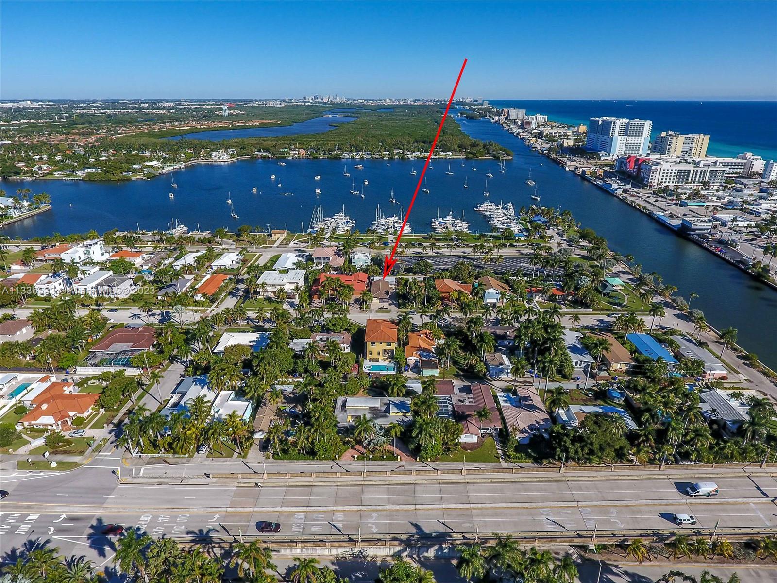 735 Tyler Street Hollywood, FL 33019 - Photo 4 of 35 a view of a city with an ocean