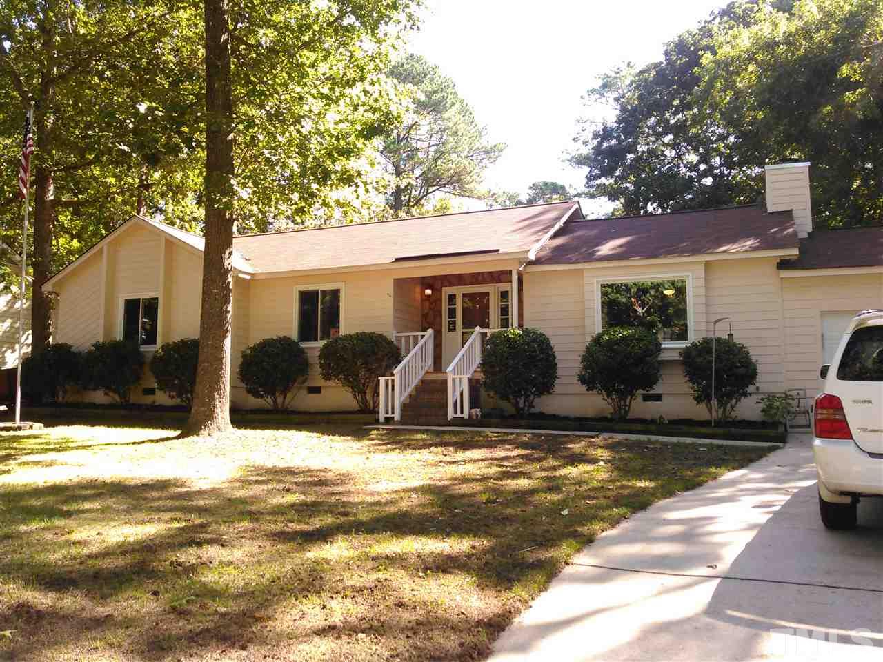 7508 Ray Road Raleigh, NC 27613 - Photo 2 of 18 a view of a house with swimming pool next to a yard
