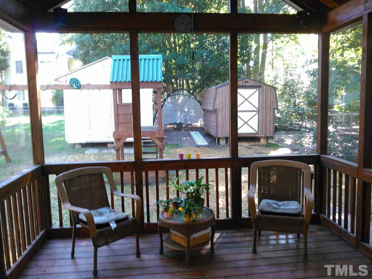 7508 Ray Road Raleigh, NC 27613 - Photo 15 of 18 a view of a chair and table in the balcony