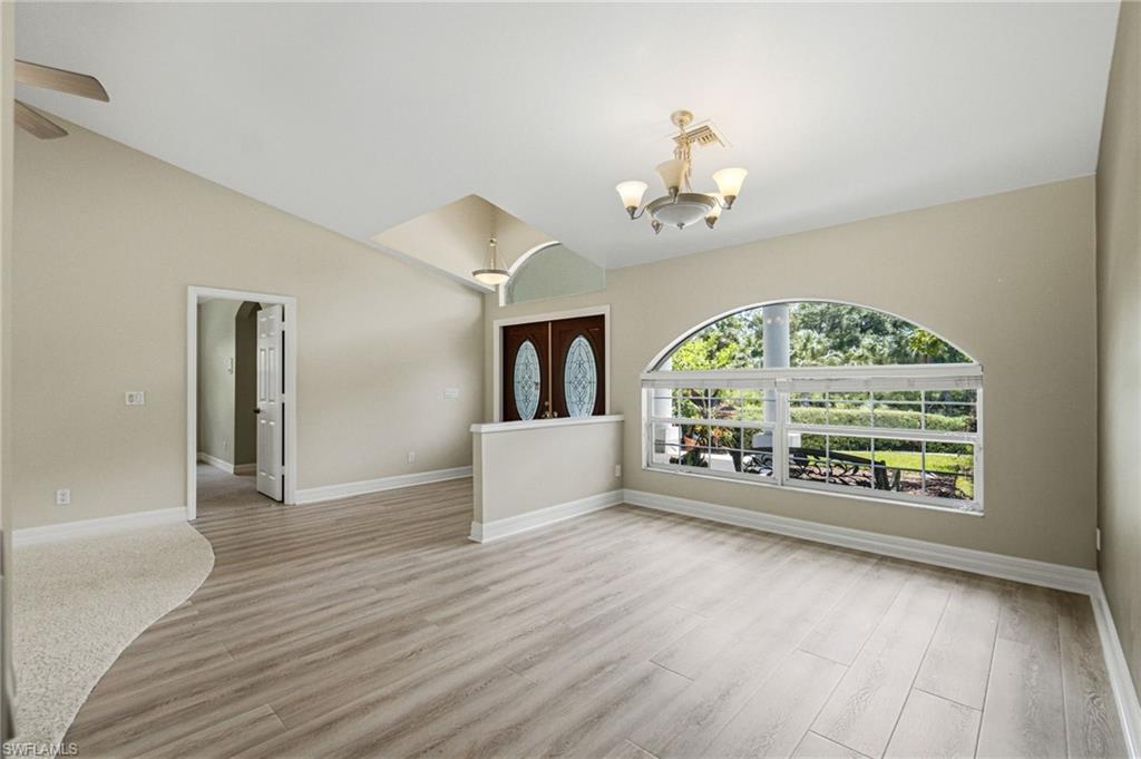 2053 17th Street Southwest Naples, FL 34117 - Photo 7 of 47 a view of an empty room with a window