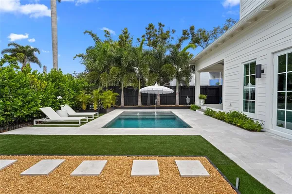 a view of a back yard of the house