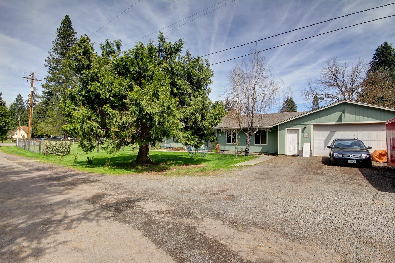407 Shady Lane Prospect, OR 97536 - Photo 9 of 35 28' x 40' attached shop! 16'x 8' door