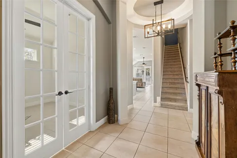 a work room with furniture and a window