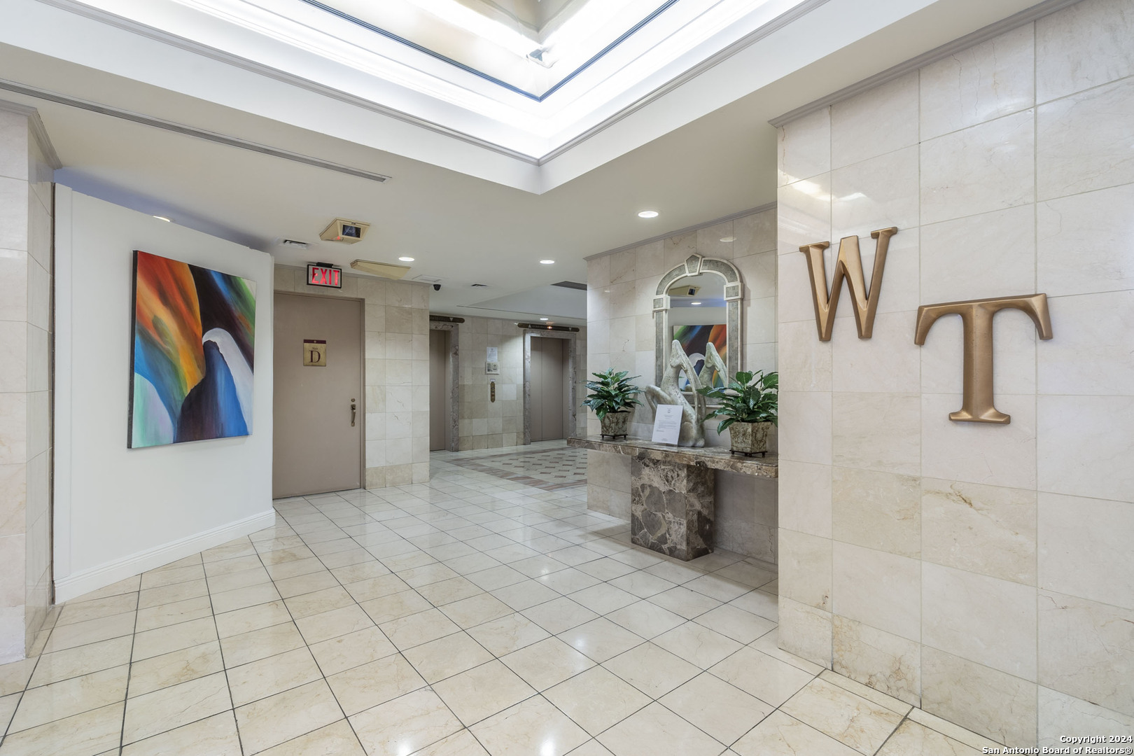 7701 Wurzbach Road, Unit 2302 San Antonio, TX 78229 - Photo 33 of 40 a view of a hallway with workspace