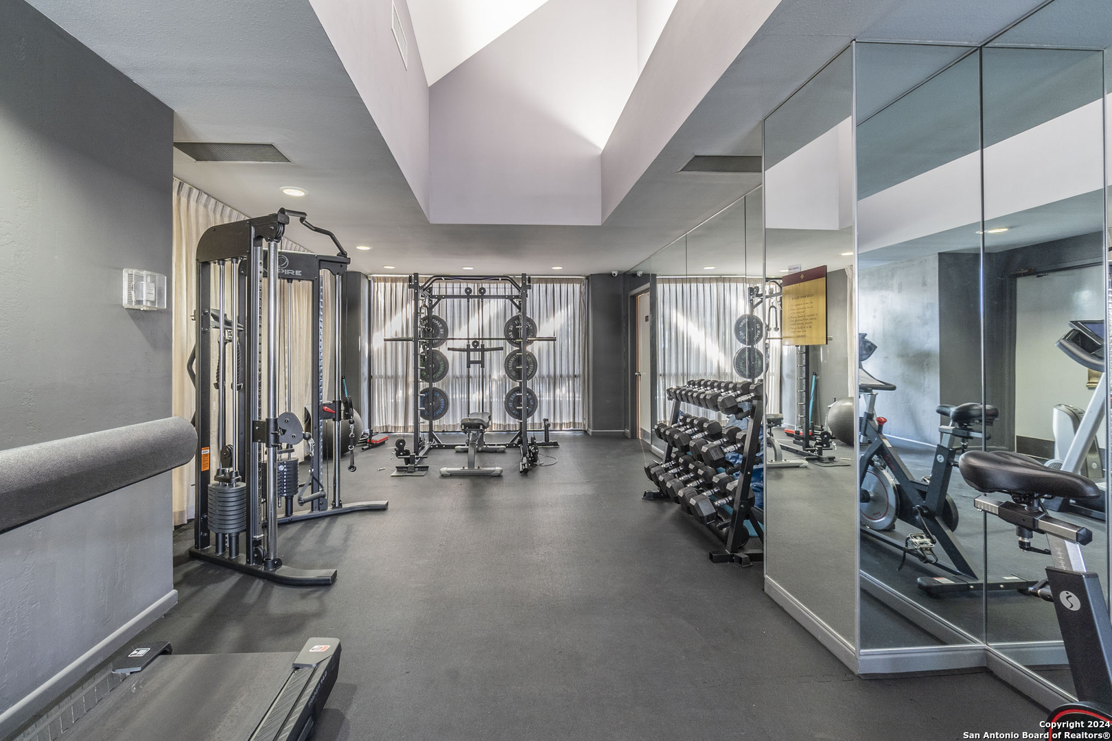 7701 Wurzbach Road, Unit 2302 San Antonio, TX 78229 - Photo 34 of 40 a view of a room with gym equipment
