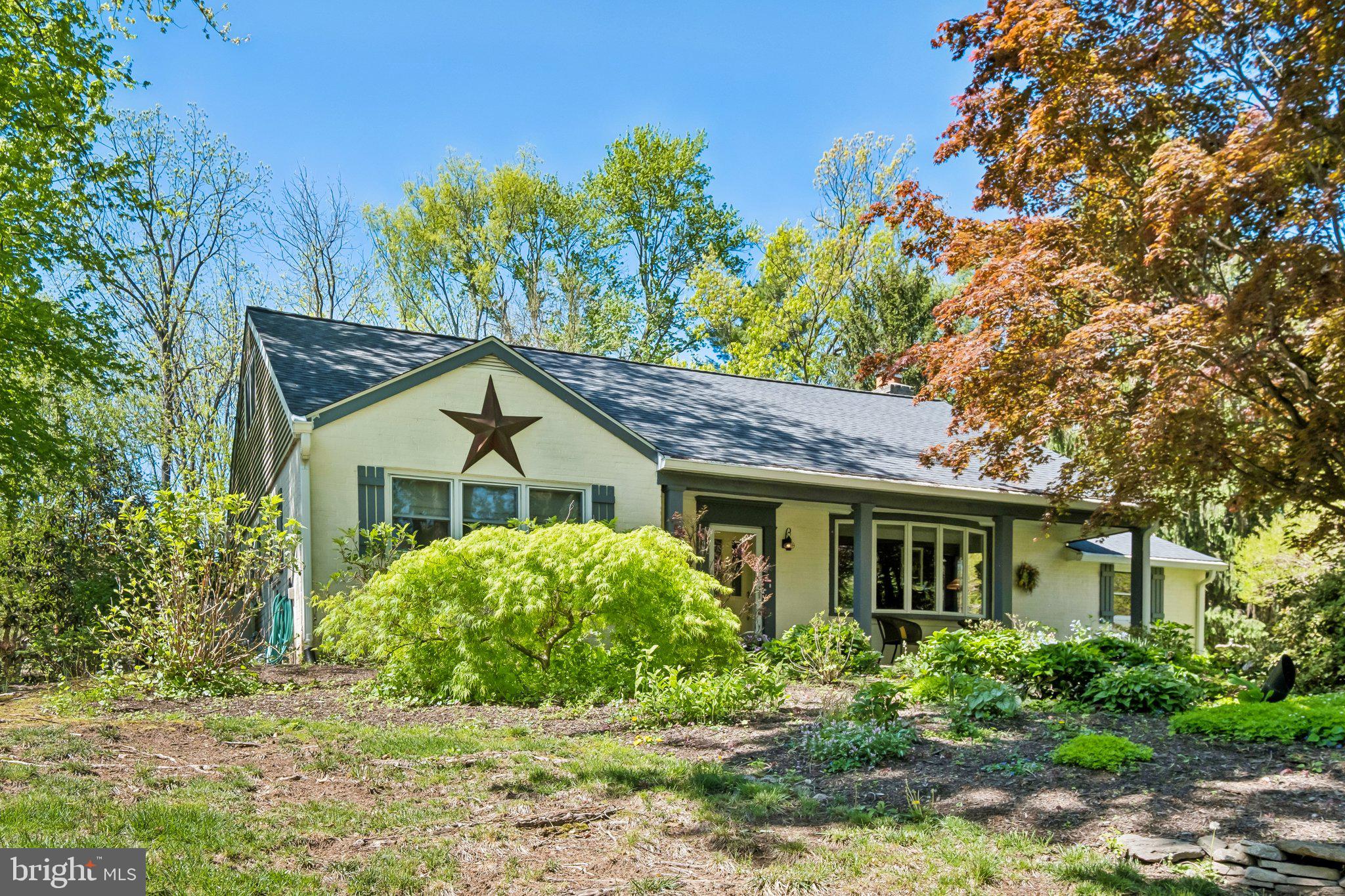 713 Alene Road Ambler, PA 19002 - Photo 2 of 40 a house with a tree in front of it