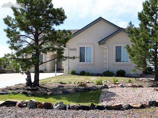 9456 Rockingham Drive Peyton, CO 80831 - Photo 6 of 7 RV Parking, 3 Car Heated Garage, Well Appointed On Lot
