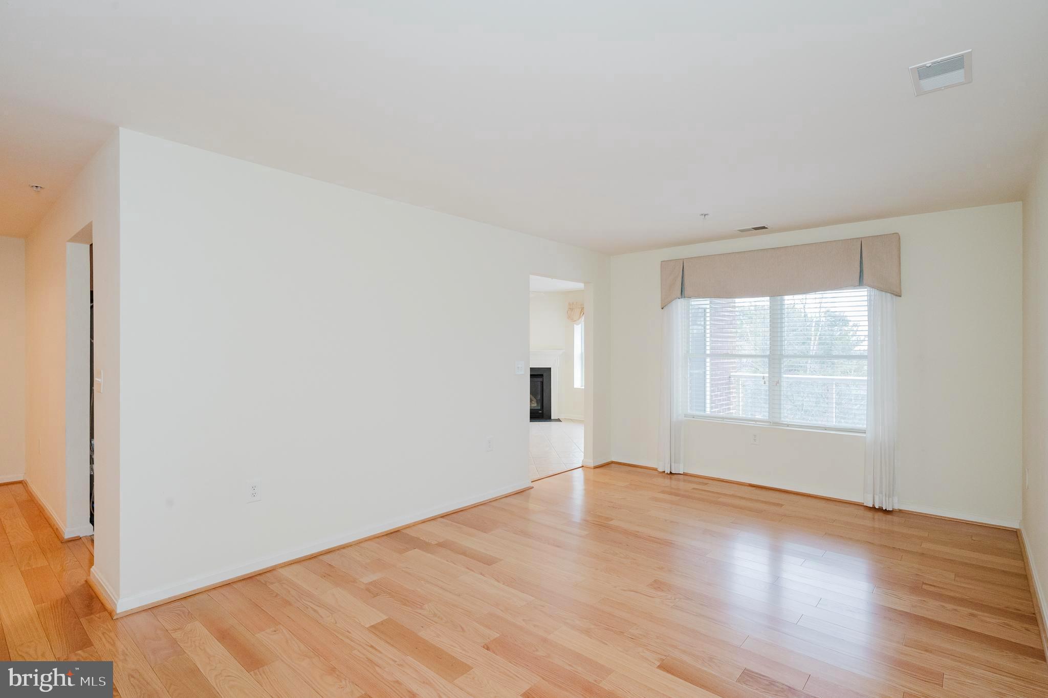 12240 Roundwood Road, Unit 405 Lutherville-Timonium, MD 21093 - Photo 9 of 51 LIVING ROOM