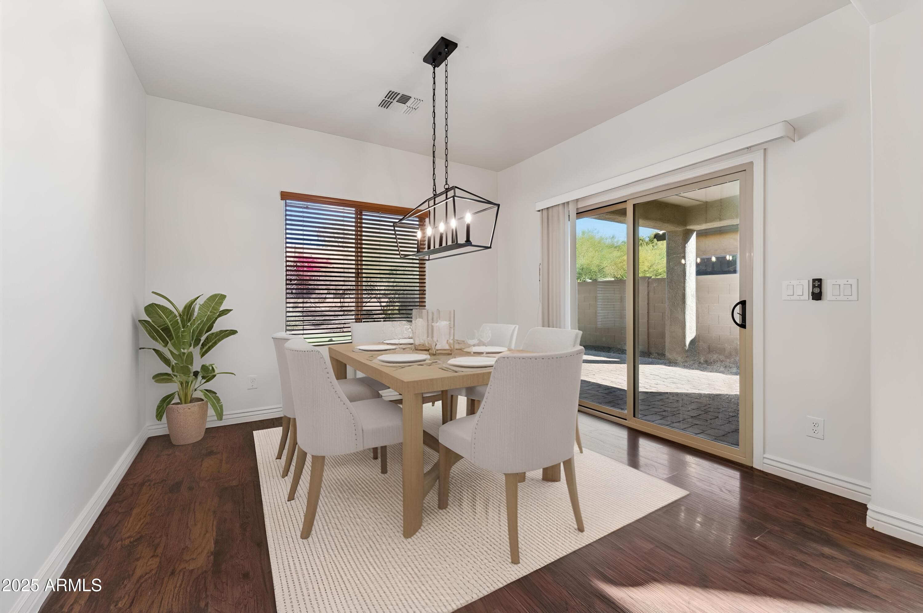 1630 West Red Bird Road Phoenix, AZ 85085 - Photo 3 of 26 Dining Area Open to Kitchen & Great Room