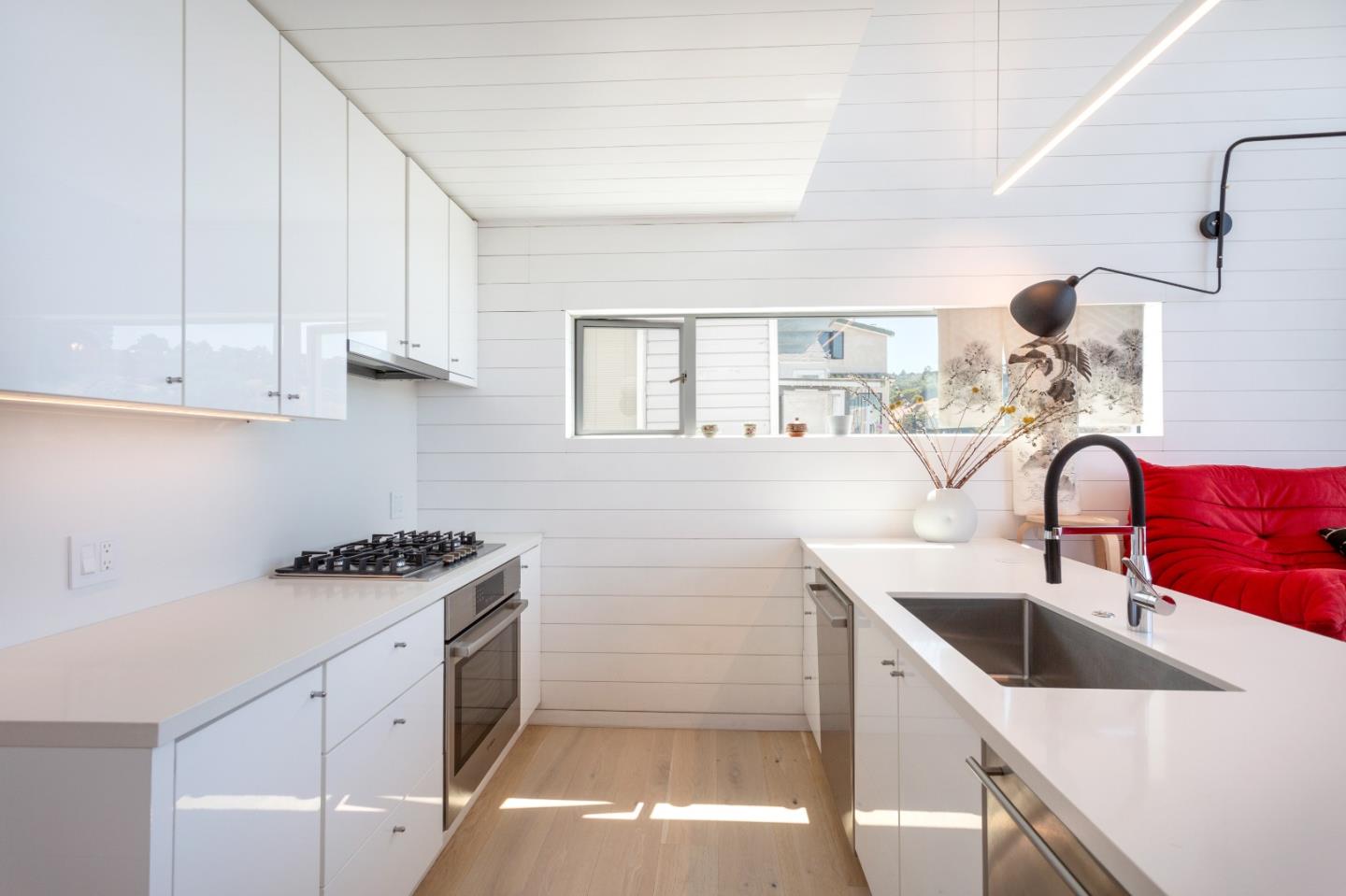 23 Gate 6 1/2 Road Sausalito, CA 94965 - Photo 15 of 34 a kitchen that has a sink and a stove