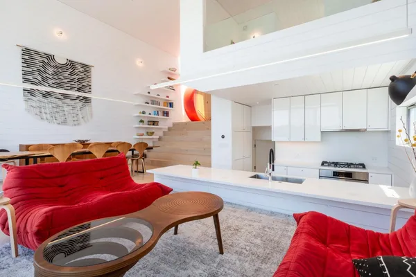 a living room with large windows
