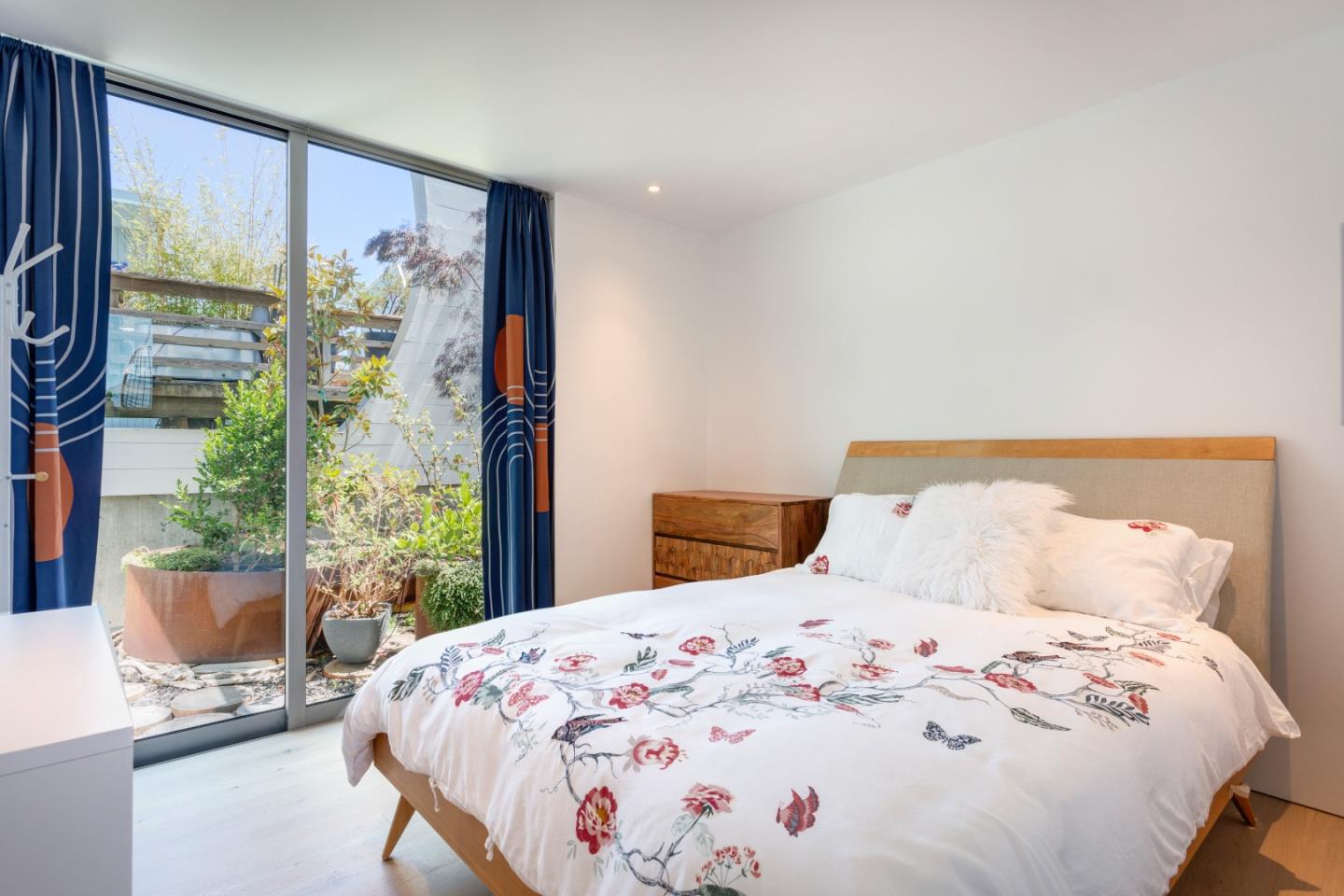 23 Gate 6 1/2 Road Sausalito, CA 94965 - Photo 27 of 34 a bedroom with a large bed and a window