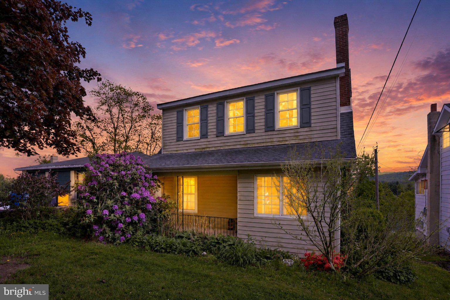 Charming home at sunset glow.