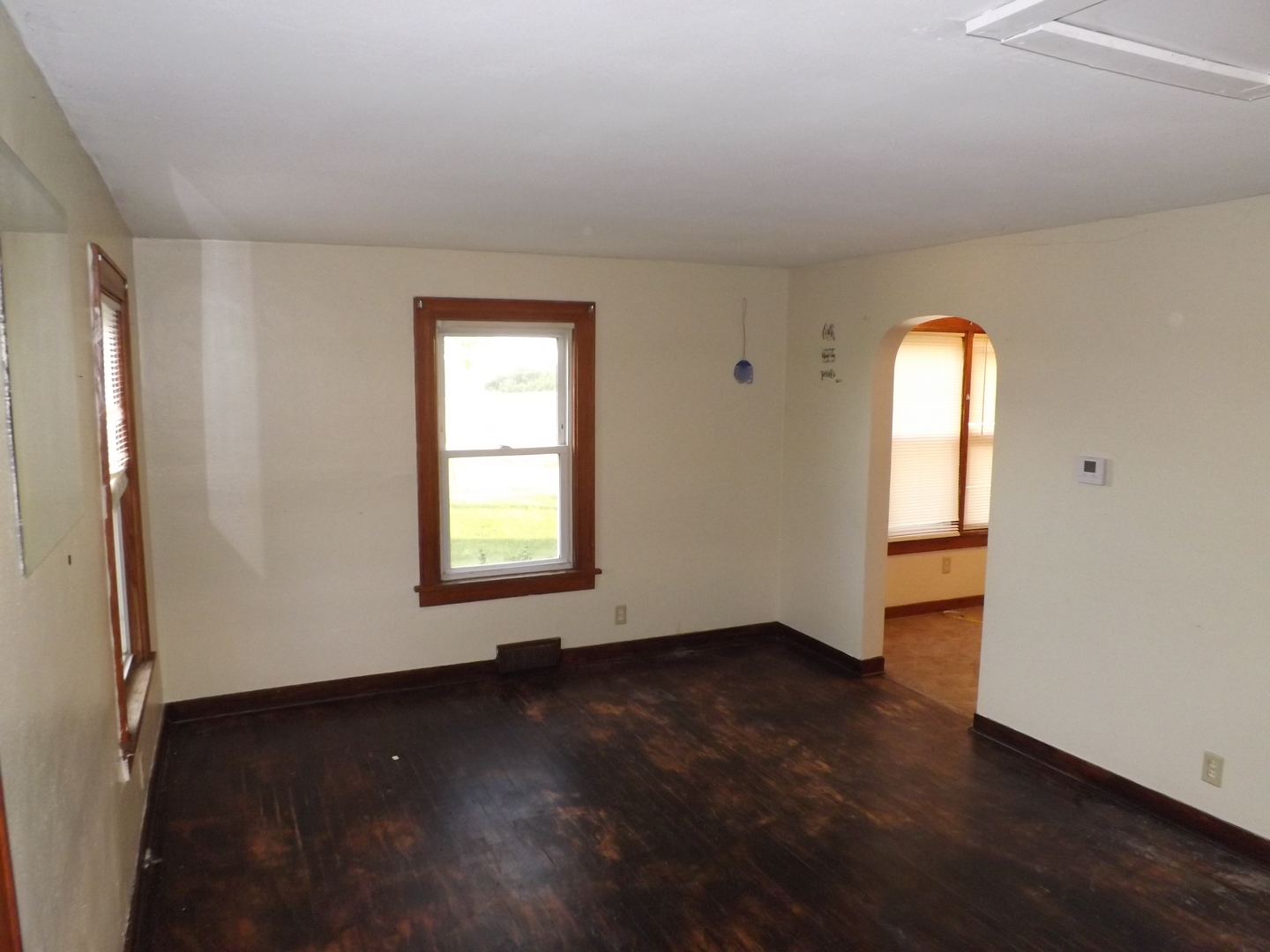 296 Timber Creek Road Dixon, IL 61021 - Photo 16 of 20 an empty room with wooden floor and windows