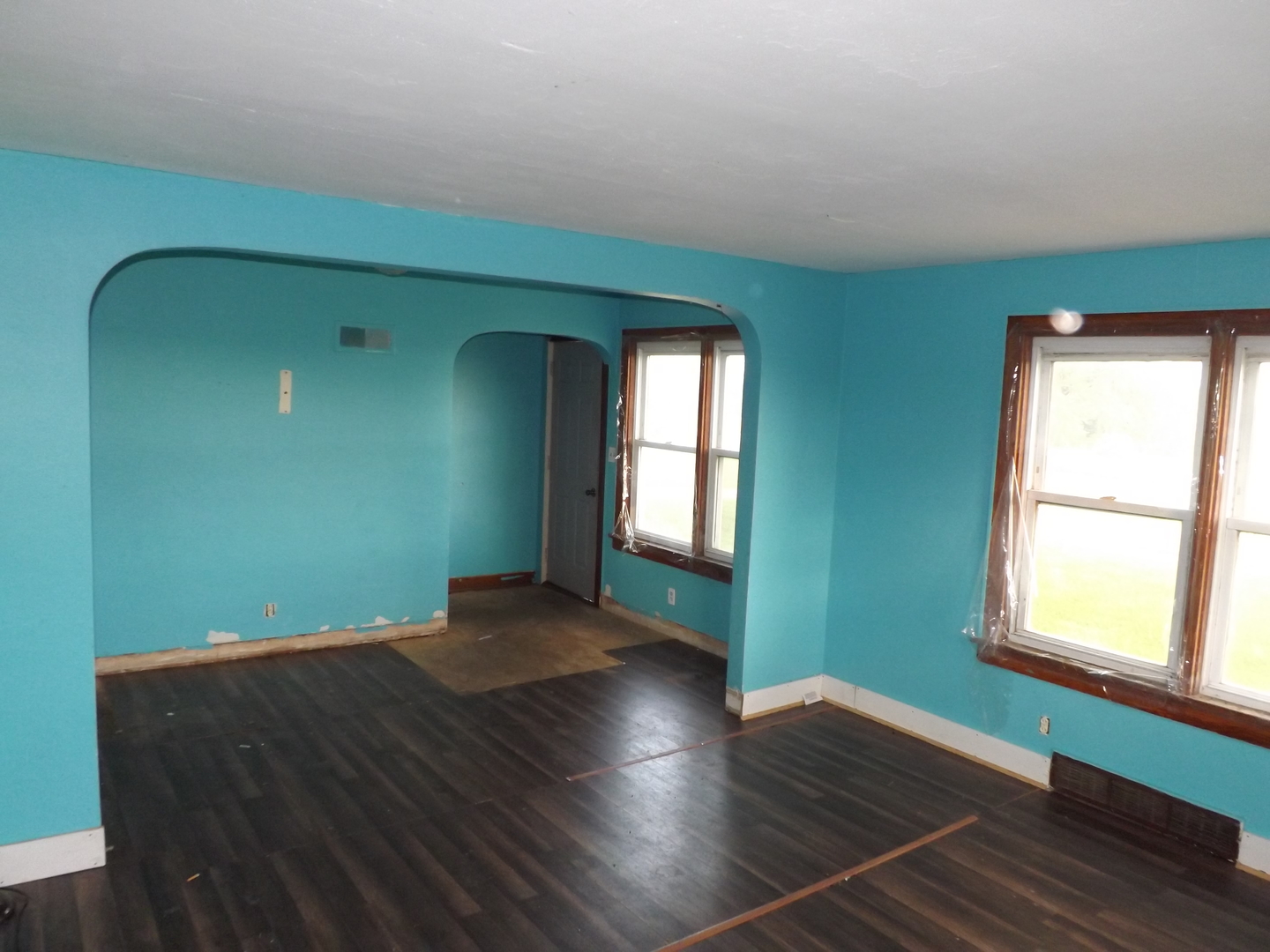 296 Timber Creek Road Dixon, IL 61021 - Photo 7 of 20 a view of an empty room with wooden floor and a window