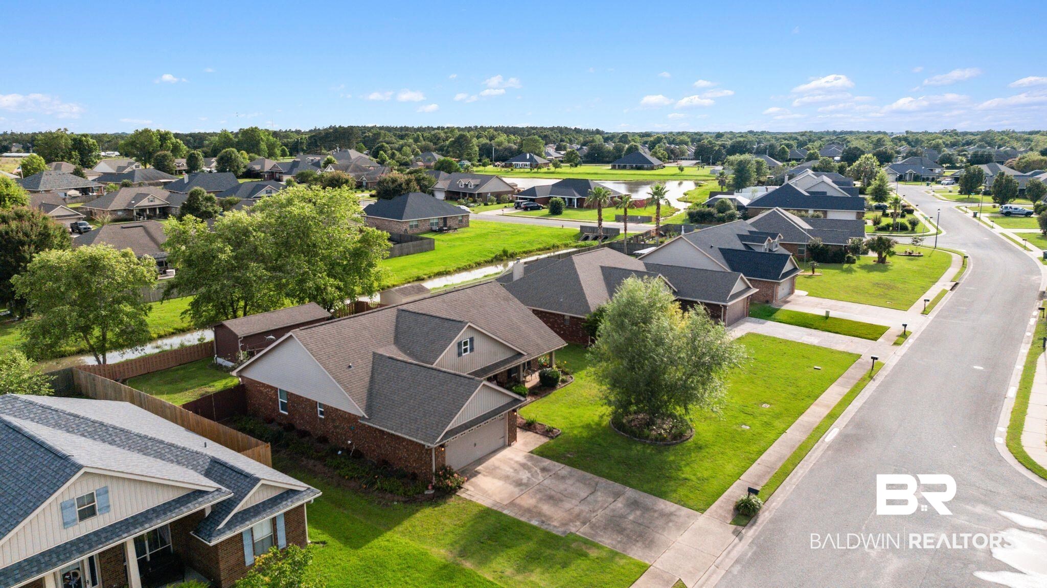 562 Vestige Mews Foley, AL 36535 - Photo 47 of 54 Residential neighborhood featuring single-story homes with shingle roofs and brick exteriors