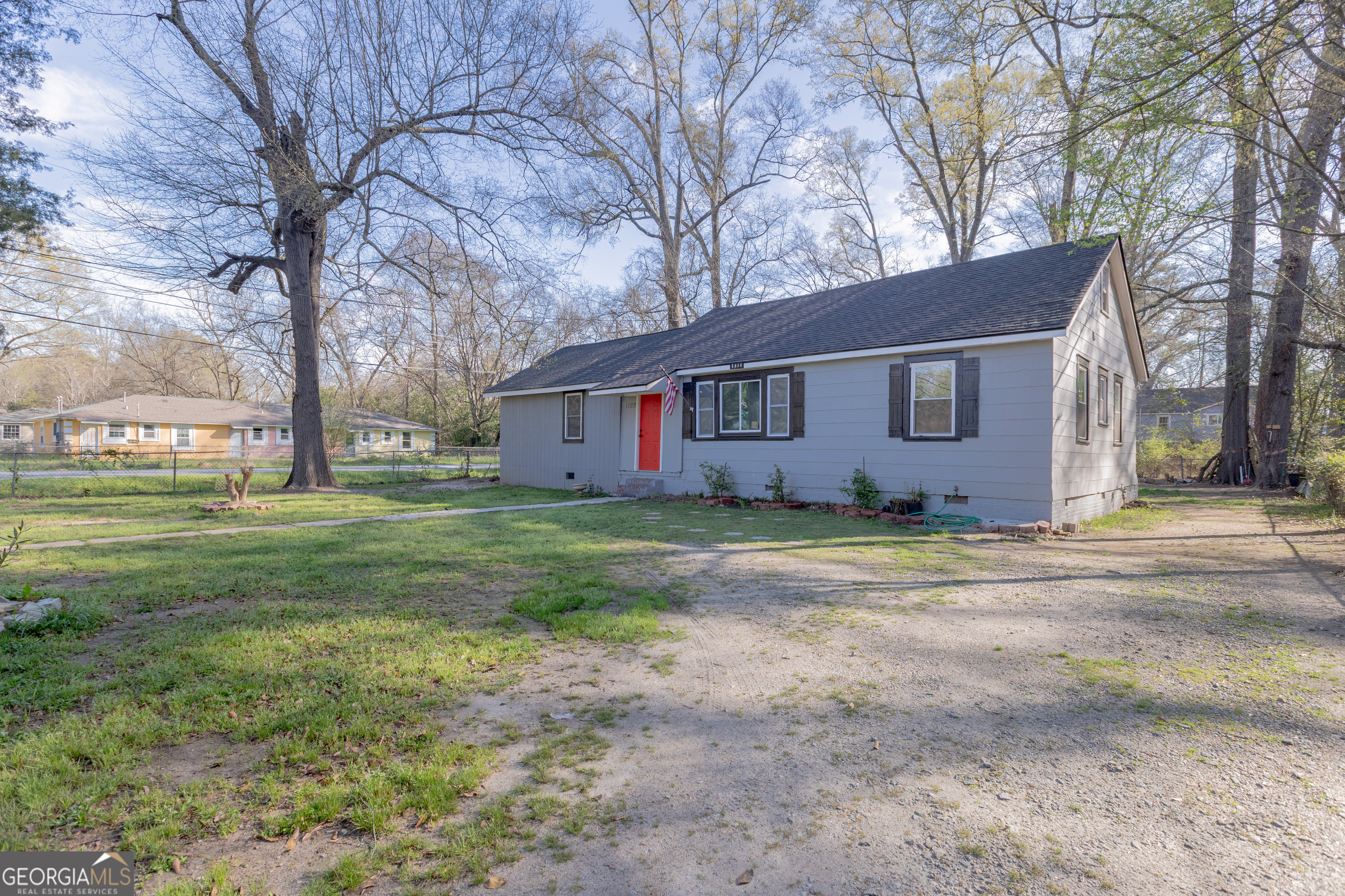 1102 Calvin Avenue Columbus, GA 31903 - Photo 2 of 18 front view of house with a big yard
