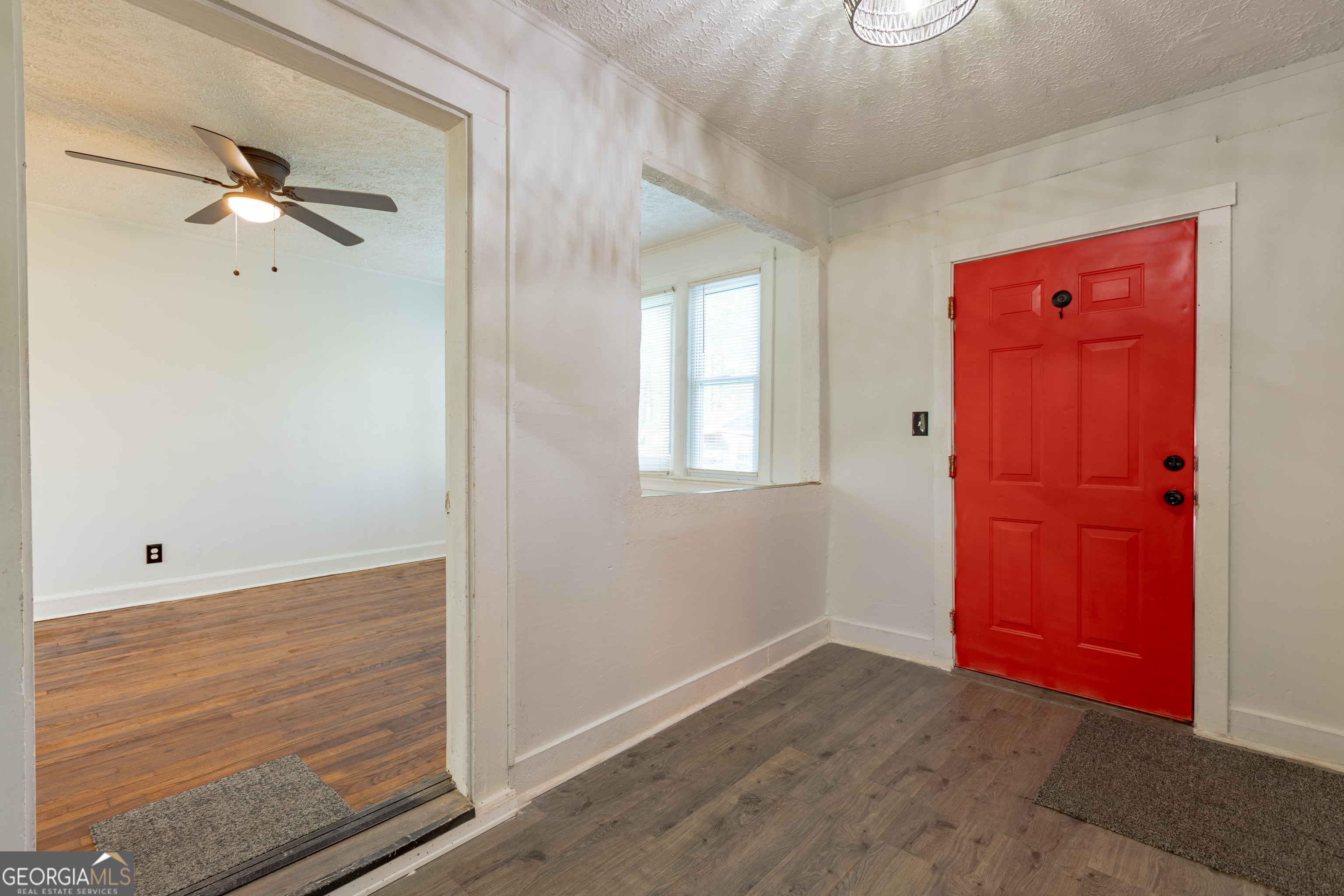 1102 Calvin Avenue Columbus, GA 31903 - Photo 3 of 18 a view of empty room with wooden floor