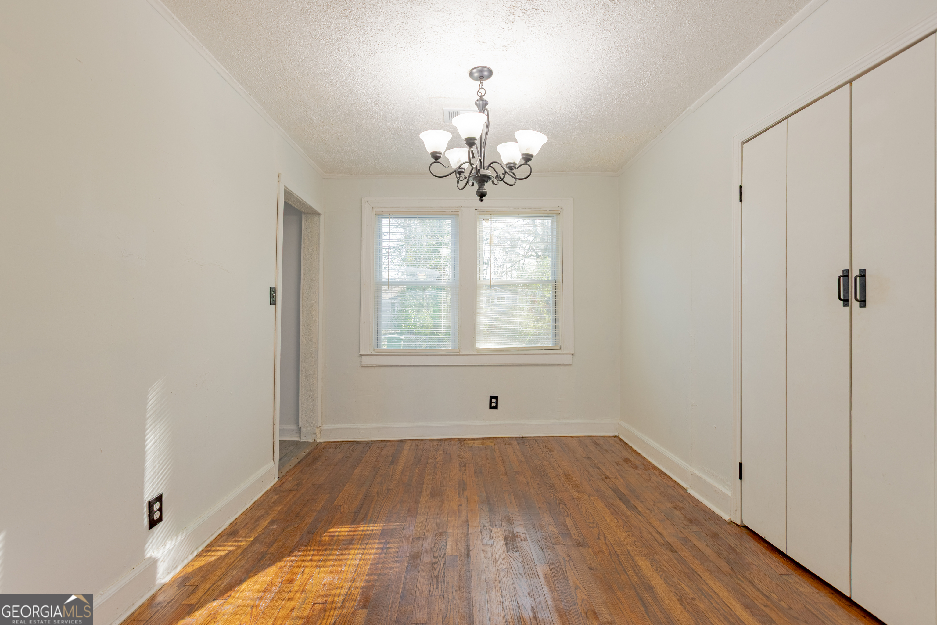 1102 Calvin Avenue Columbus, GA 31903 - Photo 6 of 18 a view of an empty room with a window