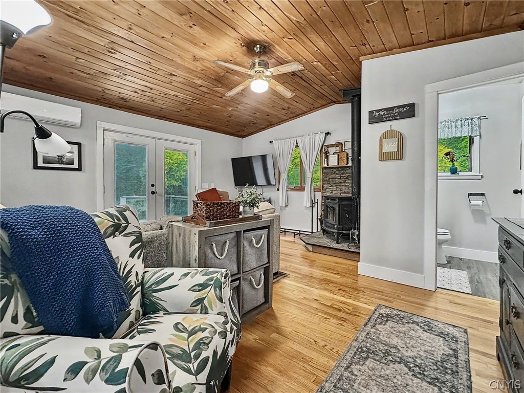 6628 East Homer-Baltimore Road Preble, NY 13077 - Photo 13 of 49 Den with Half Bath and Wood Stove