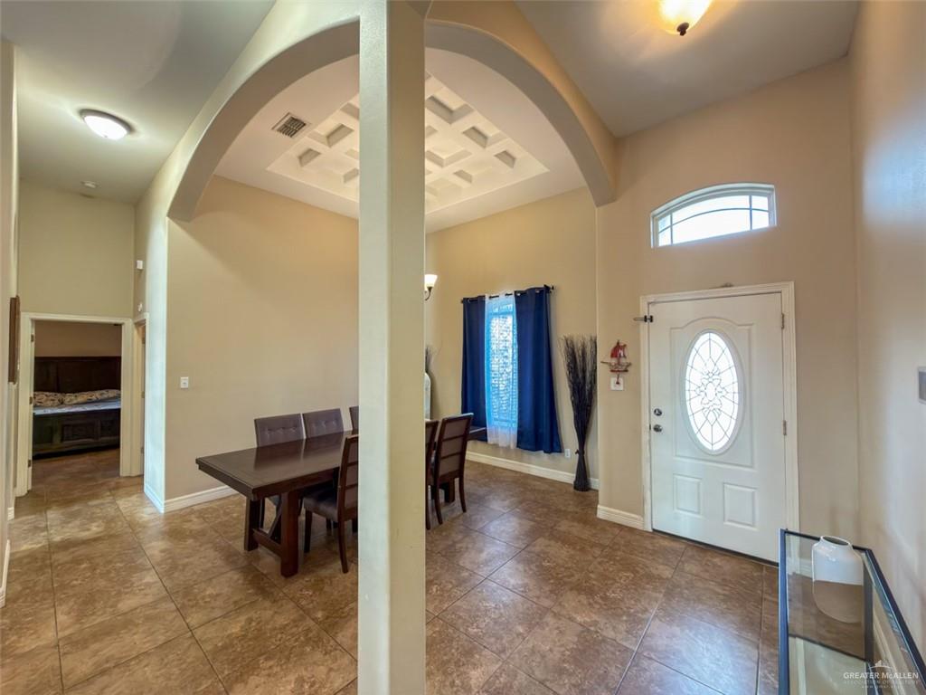 208 North 15th Street Hidalgo, TX 78557 - Photo 6 of 26 a view of a hallway with entryway wooden floor and front door