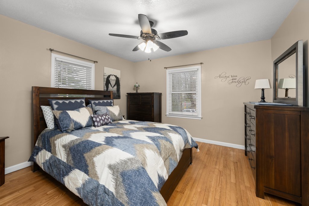 925 12th Avenue Moline, IL 61265 - Photo 14 of 36 a bedroom with a large bed and a window