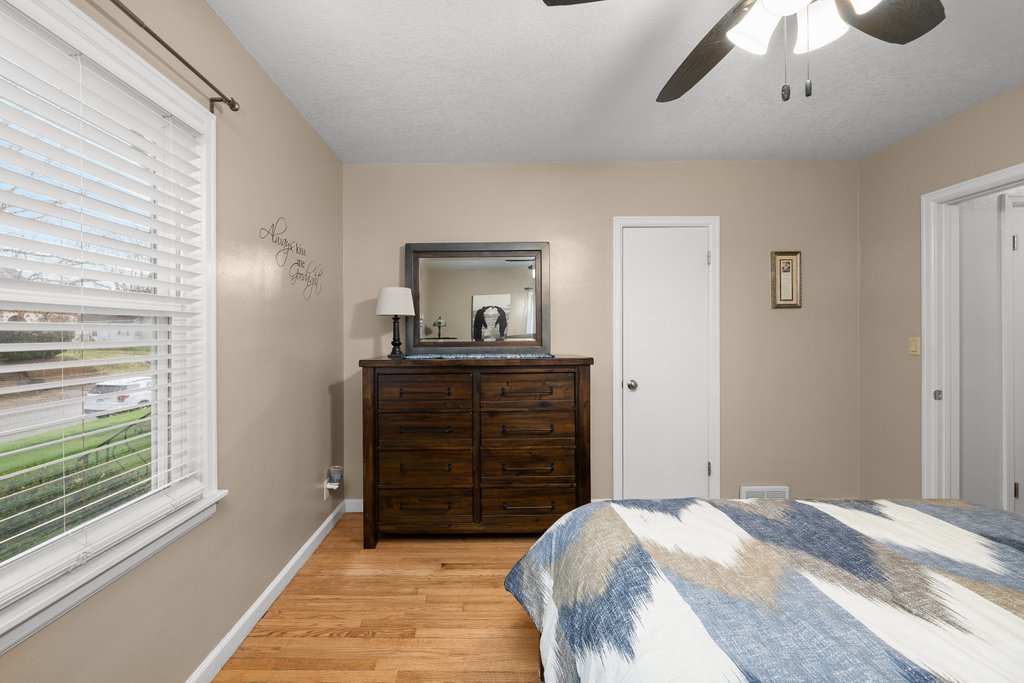 925 12th Avenue Moline, IL 61265 - Photo 15 of 36 a bedroom with a bed and a dresser