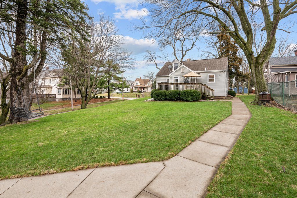 925 12th Avenue Moline, IL 61265 - Photo 34 of 36 a porch with trees and a yard