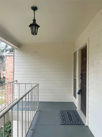 a kitchen with stainless steel appliances a stove a microwave and cabinets