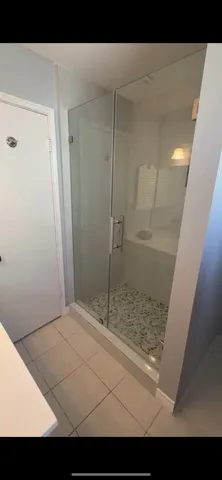 a view of a park with large trees