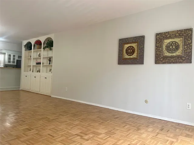 a view of a porch with wooden floor and outdoor space