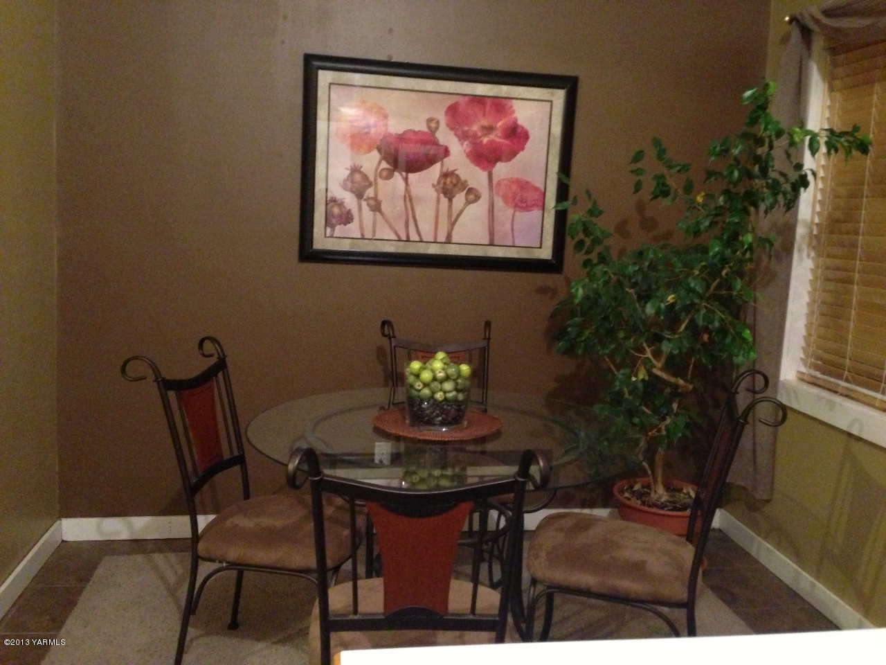 3313 Independence Road Sunnyside, WA 98944 - Photo 5 of 11 a view of a dining room with furniture window and wooden floor
