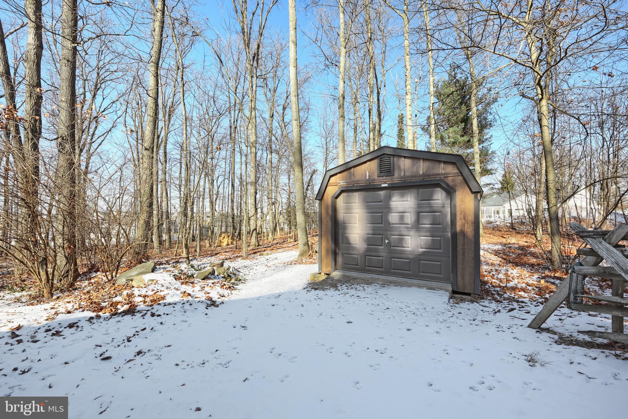 4205 Grandview Road Hanover, PA 17331 - Photo 15 of 70 Charming shed nestled in a snowy woodland.
